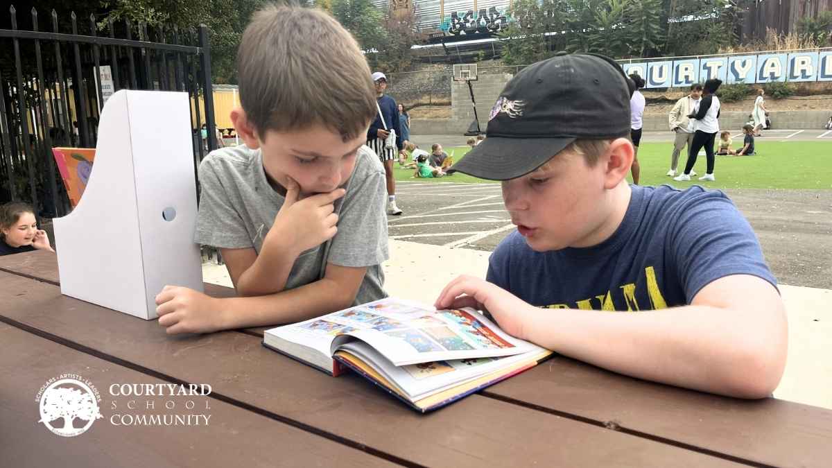 Courtyard School Sacramento - small class sizes, two boys reading together